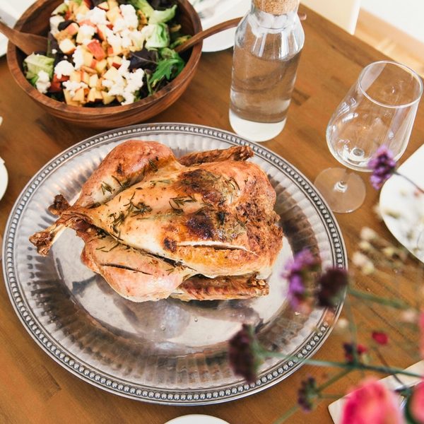 A roast turkey on a holiday table